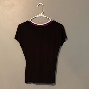 Black tee with red white and blue striped collar